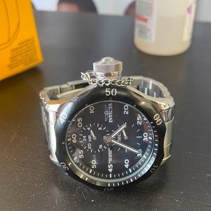 Silver Invicta Watch.